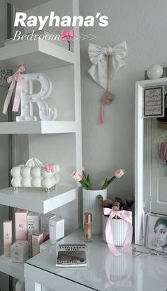 a white desk topped with shelves filled with personal items