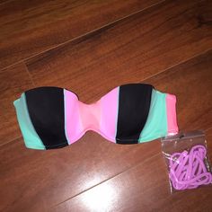 Brand New Victoria Secret Bandeau Swim Top With Tags! Size 32b. Colors Are: Aqua, Hot Pink, Light Purple, And Black Feel Free To Make Offers! Trendy Strapless Tube Top For Poolside, Trendy Pink Strapless Tube Top, Trendy Multicolor Tube Top For Beach, Trendy Multicolor Tube Top For The Beach, Fitted Multicolor Tube Top For Beach Season, Multicolor Bandeau Tube Top For Poolside, Multicolor Strapless Tube Top For Beach Party, Trendy Multicolor Bandeau Tube Top, Pink Bandeau Tube Top For Beach Party