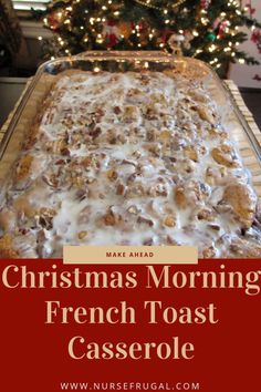 christmas morning french toast casserole with white icing in front of a christmas tree