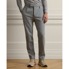 These trousers’ compact jersey fabric is made with a soft cotton blend that includes fine wool. Their elastic waistband and pleated front offer the look of traditional tailoring with the modern comfort of Ralph Lauren sportswear. Elegant Tailored Ralph Lauren Pants, Ralph Lauren Tailored Bottoms For Business Casual, Classic Ralph Lauren Dress Trousers, Ralph Lauren Tapered Leg Formal Pants, Ralph Lauren Formal Tapered Leg Pants, Fitted Ralph Lauren Pants For Business Casual, Ralph Lauren High-waisted Workwear Pants, Ralph Lauren High-waisted Workwear Bottoms, Ralph Lauren Fitted Business Casual Pants