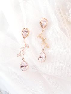 Rose Gold Teardrop Chandelier Earrings Gift, Elegant Rose Gold Earrings For Wedding, Rose Gold Dangle Earrings For Anniversary, Delicate Cubic Zirconia Earrings For Wedding, Elegant Rose Gold Teardrop Earrings For Wedding, Rose Gold Drop Bridal Earrings For Formal Occasions, Elegant Rose Gold Chandelier Earrings For Weddings, Delicate Bridal Earrings With Elegant Design As Gift, Elegant Gold Bridal Earrings For Wedding Gift