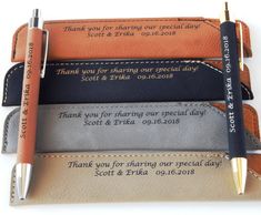 three leather pen holders with personalized pens in them and some writing on the back