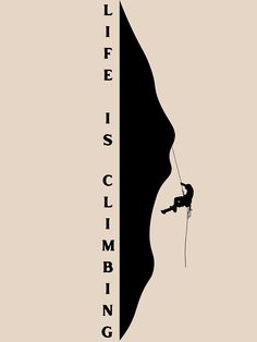 a man climbing up the side of a cliff