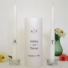 * Pillar candle includes wedding couples first names and wedding date * Tapers each have the first name initials of the wedding couple * Comes with monogram design that you can personalize with the wedding couples initials * Pillar candle measures 3 x 8  * 2 taper candles measure 10 * Candles color are a creamy white * Weighs 3lbs total * Made with 100% American Paraffin and Beeswax * Specially designed wick that allows the candle to burn straight down the center, leaving the outside design inta Wedding Unity Candle, Outside Design, Wedding Unity Candle Set, Couples Initials, Unity Candle Set, Wedding Unity Candles, Unity Candle Sets, Wedding Unity, Unity Candle