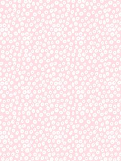 a pink and white background with small circles