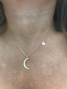 "Beautiful 14k yellow gold Crescent Moon & Star necklace. The moon is attached at the center of the chain, the star from the side. Great necklace for you or someone special! Adjustable chain length anywhere from 16\"- 18\". *Adjustable length:16\"-18\" *Solid 14k gold *Moon measurement: 3/4\" *Star measurement: 1/4\" *Approximate weight: 3.15 grams Upgrades for FedEx/UPS guaranteed 2-day delivery are available and can be selected prior to checkout without separate invoicing. It is generally Gold Moon, Crescent Moon, Crescent, Star Necklace, Wedding Bridesmaids, Stars And Moon, Chain Lengths, Mother’s Day, Cross Necklace