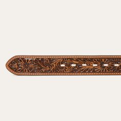 Made from top grain leather, this belt has a 1 ½” wide cognac pebble grain leather strap and tooled cognac leather tabs. It features seven holes on the point end to ensure a proper fit for all body types and is finished with a two-tone Stetson buckle. At once rugged and refined, each of our belts embodies our legendary commitment to quality and attention to detail. 1 ½” Wide Two-Tone Stetson Buckle Leather Imported Combat Boots Heels, Felt Cowboy Hats, Straw Cowboy Hat, Concert Fashion, Boot Jewelry, Buckle Bracelet, Cuff Earrings, Top Grain Leather, Girl With Hat