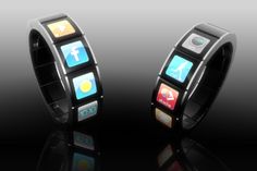 two black bracelets with different colored app icons on them, one in the shape of a cell phone