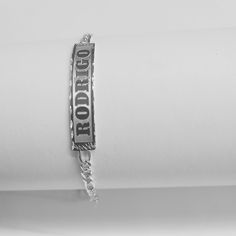 "-Bracelets Handmade Item. -Can be personalized: Him or Her. -Jewelry Type: ID Bracelet. -Material: Solid 925 Sterling Silver. -Color: Silver. -Purity: Silver .925. -Plaque Dimensions: 38mm Long X 8mm Wide (Default) -Thickness ID Bar: .6mm. -Link Style: Figaro Chain. -Clasp: Lobster Claw. -Thickness Chain: 3.7mm. -Bracelets length available: (5.5\",6\",6.5\",7\",7.5\",8\",8.5\"). - Bracelet Letters: (Max 9 letters). Please First letter upper case and rest lower case. -Choose one Style Bracelet C Bracelet Letters, Figaro Bracelet, Boys Names, Bracelet Diamond, Figaro Chains, Figaro Chain, Id Bracelets, Lower Case, Engraved Bracelet