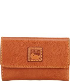 From the Florentine Collection by Dooney & Bourke&#x2C; the Leather Flap Wallet features:LeatherFlap closureOne inside zip pocketID windowBillfold compartment8 credit card slotsApprox. 3.75" H x 0.75" W x 6" LApprox. weight 5-oz.Imported. Cognac Leather Wallet, Dillard's, Dooney Bourke, Credit Card, Wallet, Leather