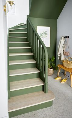 there is a green staircase in the house