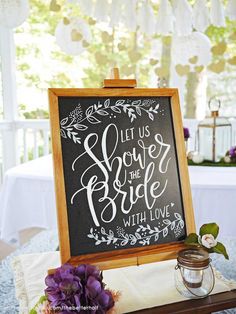 a sign that says let us shower the bride with love