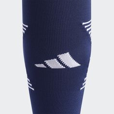 adidas Play to your potential in these adidas soccer socks. Moisture-wicking yarn keeps feet dry during high-intensity scrimmages and games. The lightweight design allows for optimal ball touch. Arch and ankle compression provide extra support. Adidas Sports Socks With Logo, Adidas Sporty Socks For Sports, Sporty Adidas Socks For Sports, Blue Sports Socks, Over The Calf Socks, Soccer Socks, Adidas Soccer, Calf Socks, Adidas Online