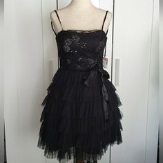 Brand:Deb Style: 390444 Rn# 136336 Y2k Early 2000's Size: 3/4 Juniors Color: Black Details: -Black Dress With Silver Floral Design With Black Sequin - Does Come With A Bow/Ribbon That Can Be Used.. - Zips Up On The Side Of The Dress - Front Does Have Some Padding - Strapless - Built In Slip Material: Self 100% Polyester Lining 100% Polyester Measures Appox.. Ptp: 13" Length: 26" Without Straps Brand New With Tags Still Attached Originally: $82.50 Marked Down: $49.99 2000s Hoco Dress, 2000s Formal Dresses, Early 2000s Dresses, 2000 Dress, 2000s Dresses, New Y2k, Deb Dresses, Y2k Dress, Bow Ribbon