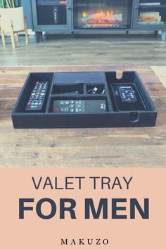 a tray that has remotes in it with the words valet tray for men