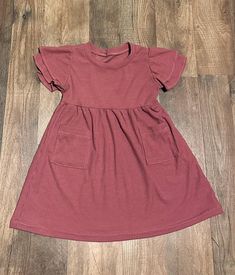 "'oh so soft' Ribbed knit dress. Closest sizing is 18-24 month. Measurements are listed below. Waist line does have elastic and will stretch if used for an older or younger child. Measurements: Length: 19\" Waist: 21\"" Pink Stretch Twirl Dress, Casual Style, Pink Casual Stretch Twirl Dress, Pink Stretch Casual Twirl Dress, Casual Pink Stretch Twirl Dress, Casual Cotton Stretch Twirl Dress, Casual Stretch Cotton Twirl Dress, Ribbed Cotton Fall Dresses, Ribbed Knit Dress, Mother And Father