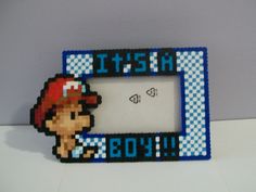 a pixel art picture frame with a video game character on it