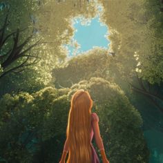 a woman with long red hair standing in the middle of a forest looking up into the sky