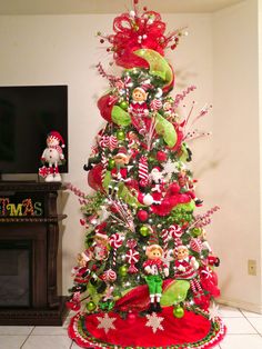 a christmas tree decorated with candy canes and ornaments