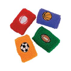 four crocheted wristbands with sports balls on them, all in different colors