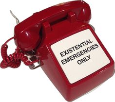 an old fashioned red telephone with the words existent emergency only on it's side