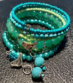 Blue and Green Beaded Memory Wire Wrap Bracelet with Silver Birds Blue Beaded Multi-strand Wrap Bracelet, Turquoise Beaded Wrap Bangle Bracelet, Stacked Beaded Bracelets, Small Bead Bracelet, Memory Wire Wrap Bracelets, Wire Wrap Bracelet, Beaded Memory Wire, Boho Wrap Bracelet, Turtle Bracelet