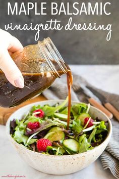 someone pouring maple balsamic into a salad