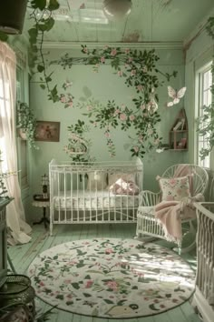 a baby's room with two cribs and flowers on the wall