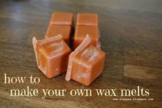 three pieces of wax sitting on top of a wooden table with the words how to make your own wax melts