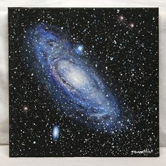 a painting of the andromidus galaxy