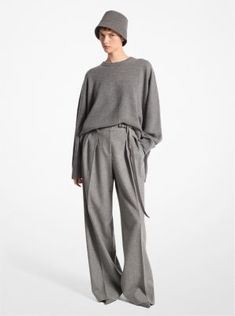 This sweater is a luxurious staple destined to become a favorite. Crafted from cashmere and designed for an intentionally oversized fit, it drapes beautifully from the shoulders and is an elegant match with pleated trousers in a similar hue. Elegant Wool Sweater For Loungewear, Oversized Elegant Cashmere Sweater, Iceland Clothes, Pleated Trousers, Michael Kors Collection, Italian Fabric, Crewneck Sweater, Iceland, Crew Neck Sweater