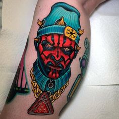 a man's leg with a tattoo on it and an image of darth vader