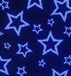 blue and white stars on a black background