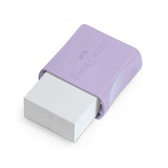 a purple and white eraser sitting on top of a white table next to a box