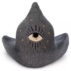 a grey hat with an eye painted on it