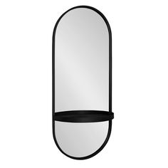 an oval mirror with a shelf underneath it