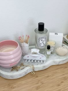 an assortment of personal care items on a tray