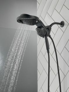 a shower head with water running from it