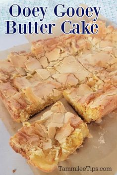 gooey gooey butter cake is cut into squares