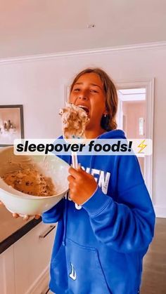 a woman holding a bowl of food and eating it with the words sleepover foods