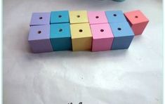 several different colored blocks sitting next to each other