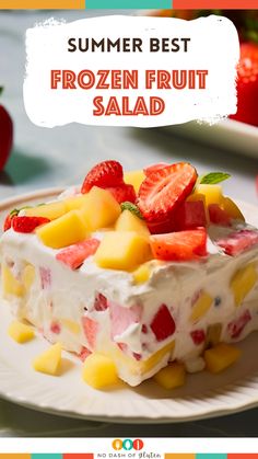 a white plate topped with fruit salad on top of a table next to strawberries