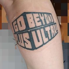 a person with a tattoo on their arm that says go beyond us ultra and is in white