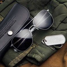 Embrace timeless style and military-grade durability with the Military Special Edition Aviator Sunglasses by Randolph Engineering. These authentic Randolph Aviators have been trusted by U.S. military pilots for over 40 years, making them the ultimate choice for those who value quality and precision. Each pair in this Special Edition Collection includes a custom military-issued embossed case, a Randolph dog tag keychain, and a military-inspired cleaning cloth. Choose from Matte Chrome, 23k Gold, Military Sunglasses, Randolph Sunglasses, Randolph Engineering, Pilot Sunglasses, Sports Sunglasses, Sunglasses Shop, Dog Tag, Pilots, Aviator Sunglasses