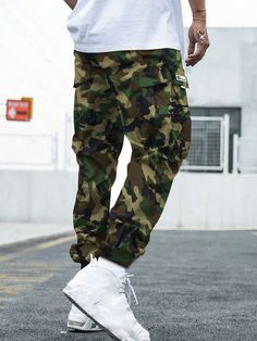 Details:Patched \nDetails:Pocket \nClosure Type:Drawstring Waist \nColor:Grey \nPattern Type:Letter \nPattern Type:Camo \nType:Cargo Pants \nWaist Line:Natural \nLength:Long \nFit Type:Loose \nFabric:Slight Stretch \nMaterial:Woven Fabric \nComposition:100% Polyester \nCare Instructions:Machine wash or professional dry clean \nPockets:Yes \nBody:Yes \nSheer:No \n Utility Cargo Pants, Pocket Cargo Pants, Teen Boy, Camo Print, Spring And Fall, Army Green, Cargo Pants, Drawstring Waist, Outdoor Sports