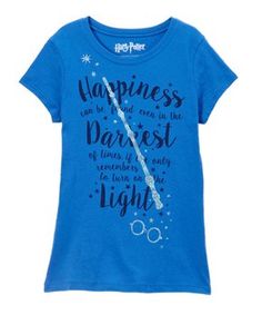 a blue harry potter t - shirt with the quote happiness is in the parest light