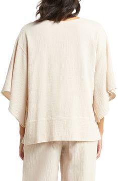 The exquisite fabrication of blissfully soft cotton, along with a boxy fit, upgrades this cropped sleep top to an indulgence. 24" front length; 27" back length (size XS) V-neck Short sleeves 100% cotton Machine wash, line dry Imported Relaxed Oversized Tops For Loungewear, Oversized Relaxed Tops For Loungewear, Effortless Relaxed Fit Tops For Loungewear, Relaxed Fit Sleep Top, Relaxed Cotton Tops For Lounging, Relaxed Fit Batwing Sleeve Tops For Loungewear, Comfortable Cotton Tops For Lounging, Cotton V-neck Tops For Lounging, Oversized Summer Tops For Lounging