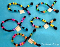 four bracelets made out of different colored beads on a blue background with the words bead