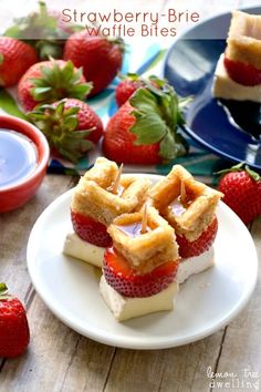 strawberry brie waffle bites on a plate with strawberries