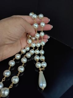 Beautiful long 1950s style necklace, made with large white Majorca pearls /12 mm/. The necklace is with a drop pendant. The necklace is very elegant, perfect for low-cut evening dresses but also for a single-colored winter sweater. The necklace is 81cm long and has an adjustable clasp with a 6cm extension. Perfect for those who love elegant style. All jewels are delivered in a decorated box, ready to be given as a gift to your loved one. How to take care of your jewellery: put on your beauty products (cosmetics, perfumes, ...) before wearing your precious jewel. Clean your jewelry with a soft cloth after wearing. Don't use water. Make sure you store your jewelry separately to avoid scratching it. Store away from heat sources, in a dry place in the special box. SHIPPING CONDITIONS I ship to Classic Pearl Drop Necklaces For Party, Classic Pearl Drop Necklace For Party, Pearl Drop Necklace For Party, Teardrop Pearl Chain Necklace For Party, Teardrop Pearl Pendant Necklace For Party, Teardrop Pearl Necklace With Pearl Charm For Party, Teardrop Pearl Drop Necklace For Party, Formal Drop Pearl Necklace With Pearl Chain, White Pearl Chain Necklace For Evening